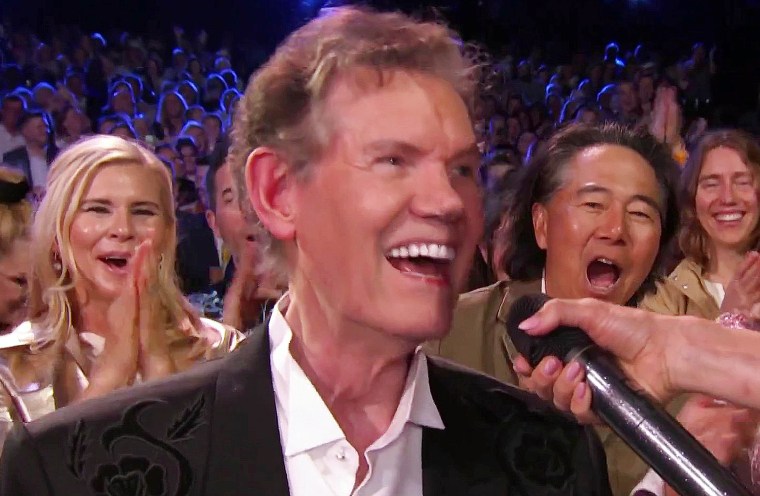 carrie-underwood-r-travis-opry100-tears-4394.jpeg